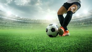Footballer Controlling a Ball With the Side of His Left Foot